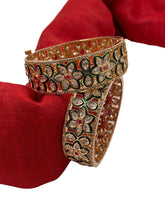 Beautiful Flower Design Polki Bangles With Green Enamel work.